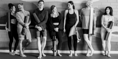 Group of yoga students at yogafusion Adelaide enjoying the $59 unlimited yoga intro month and supportive studio atmosphere