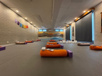 yogafusion Shanti Room with Blinds closed and Bolster laid out
