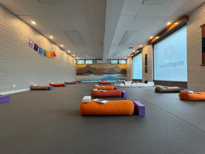 yogafusion Shanti Room with Blinds open and Bolster laid out
