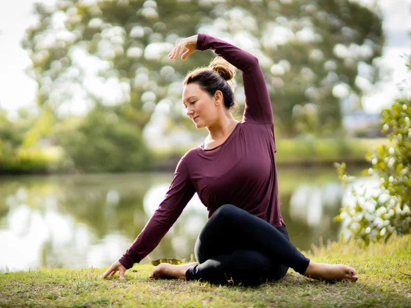 Mel Mclaughlin practicing yin yoga at yogafusion