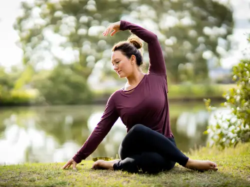Mel Mclaughlin practicing yin yoga at yogafusion