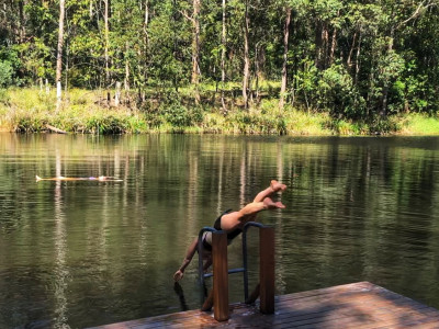 Yoga Retreat diving in for a lake swim